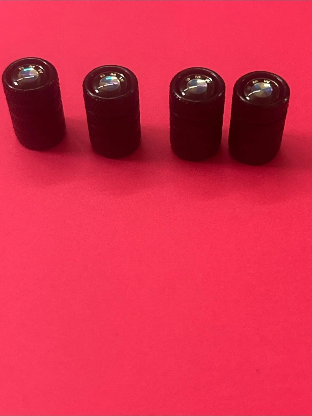 BMW Black Tire Valve Caps with Blue & White Logo - Set of 4